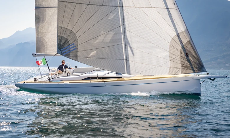 Grand Soleil Blue sailing with full sails in light wind