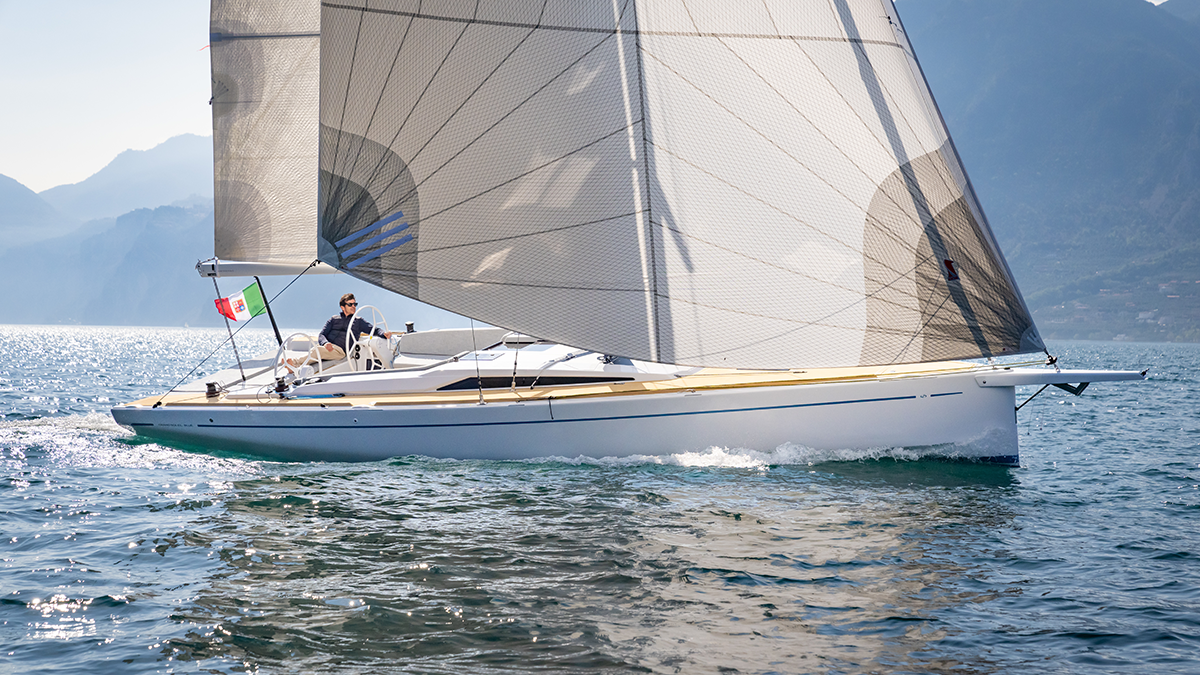 Grand Soleil Blue sailing with full sails in light wind